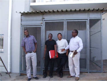 MOHSS IT Staff proudly posing in front of their new generator