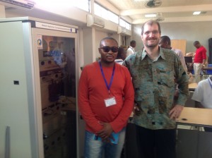 Montwedi Bushy Makgetla (Botswana) and Dykki Settle (IntraHealth International) pose with the network equipment.